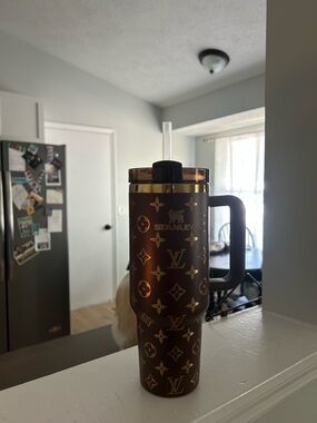 Stanley Brown Travel Tumbler with Gold Accents and Straw